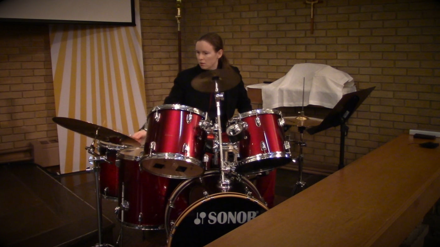 Beth playing drums